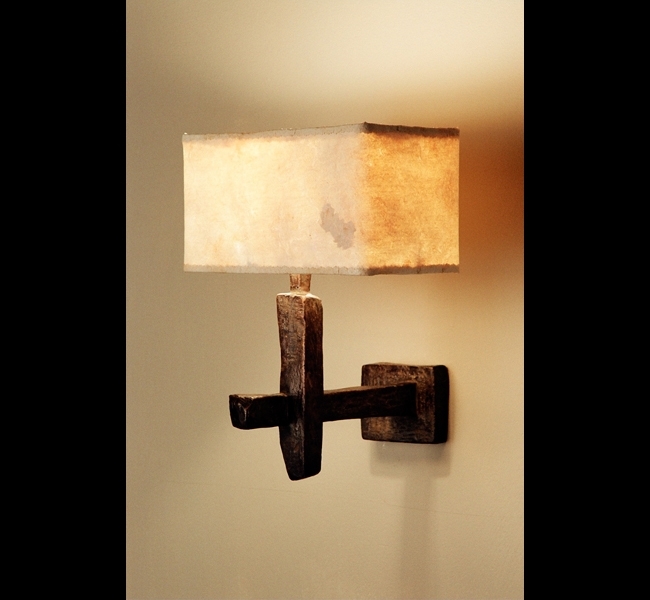 Sculptural bronze wall lamp with eucalyptus paper lampshade made by Hannah Woodhouse. 