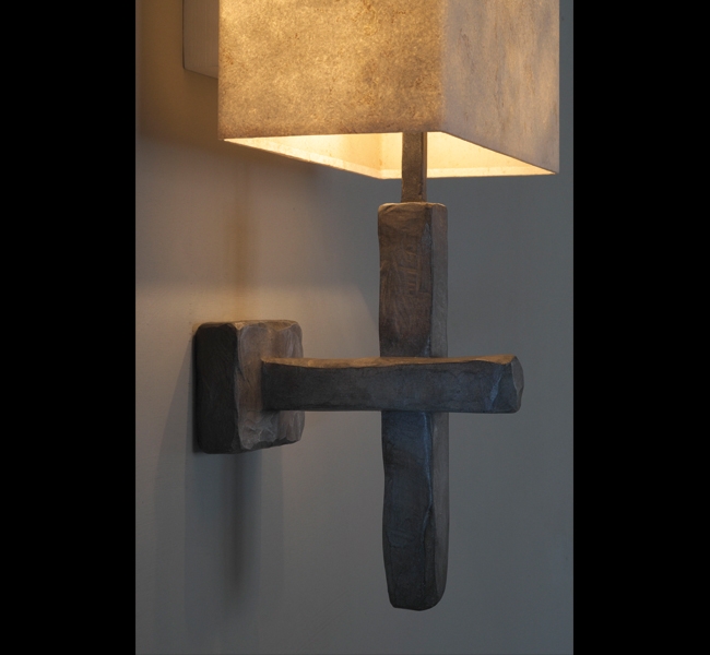 Single Criss Cross Wall Light in hand carved wood, granite or bronze finish.  Bronze Wall Applique, Bronze Wall Light by Hannah Woodhouse, commissioned by Adam Lay Studio for interior of super yacht Inukshuk, shown at Monaco Yacht Show 2013 and recently w